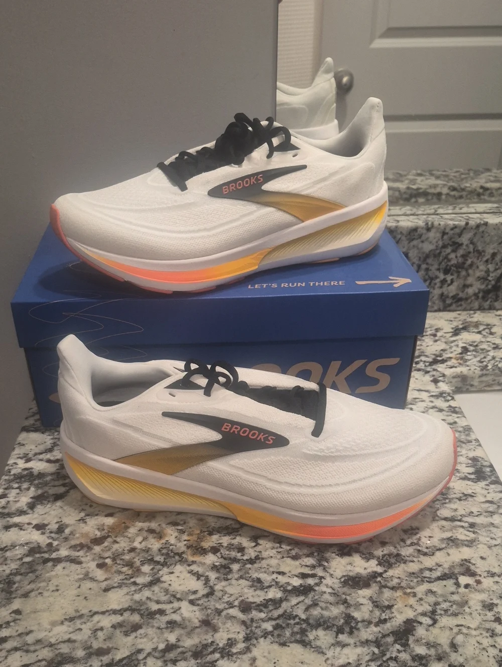 Brooks Revel 9 Men's White Running Shoes with Yellow & Coral Accents